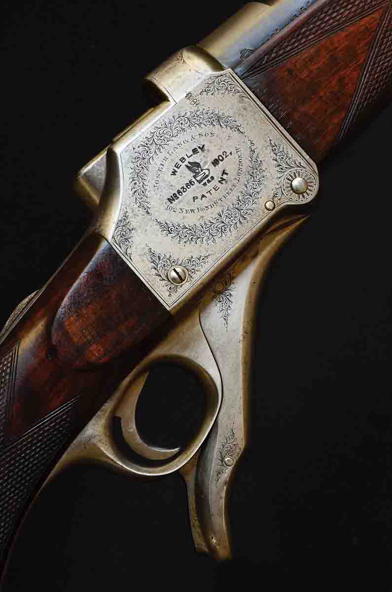 This is a Joseph Lang rifle in .475 No. 2 Nitro Express built on a Webley action. It’s a working rifle for dangerous game. Webley insisted on having its patent number on the action, so Lang complied by dressing it up. The engraving breaks up the flat, reflective surface.